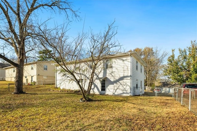 view of home's exterior featuring a lawn