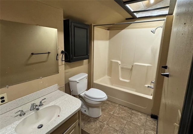 full bathroom with bathtub / shower combination, toilet, a skylight, vanity, and tile patterned flooring