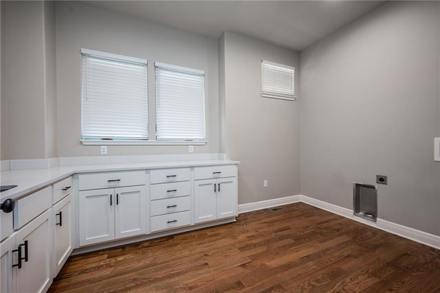 20473 199th St, Tonganoxie, KS 66086 - laundry room featuring hookup for an electric dryer, dark wood-type flooring, and baseboards