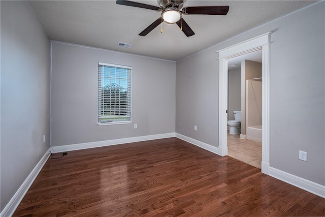 20473 199th St, Tonganoxie, KS 66086 - unfurnished room featuring ceiling fan, wood finished floors, and baseboards