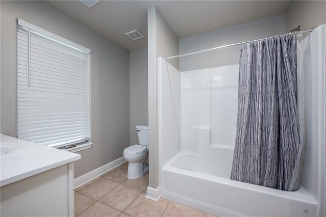 20473 199th St, Tonganoxie, KS 66086 - full bathroom with toilet, vanity, tile patterned floors, shower / tub combo with curtain, and baseboards