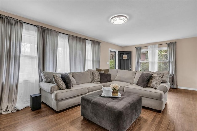 living room with dark wood-type flooring