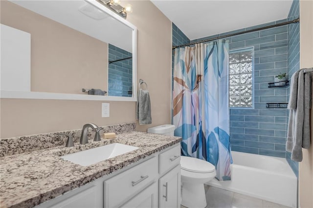 full bathroom with vanity, shower / tub combo with curtain, tile patterned flooring, and toilet