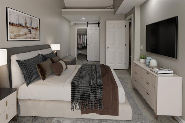 bedroom featuring a closet and a barn door