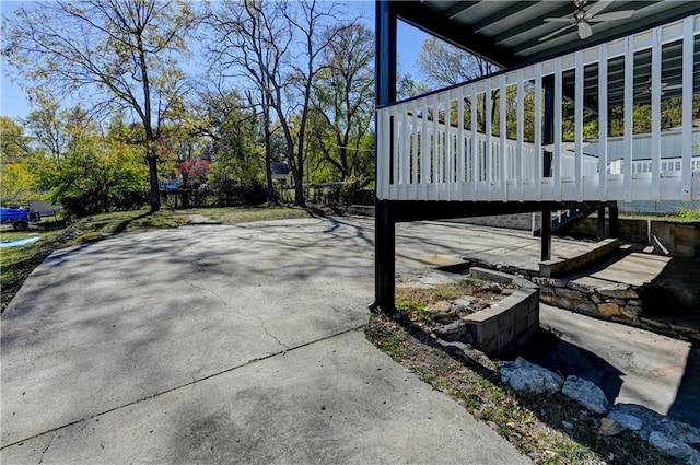 view of patio / terrace featuring ceiling fan and a wooden deck