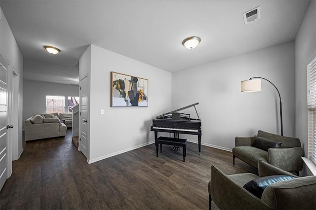 sitting room featuring dark hardwood / wood-style floors