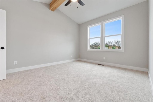 unfurnished room featuring lofted ceiling with beams, a ceiling fan, baseboards, and light colored carpet