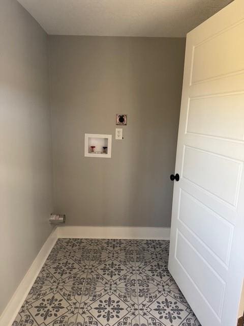 washroom with washer hookup, laundry area, baseboards, and electric dryer hookup