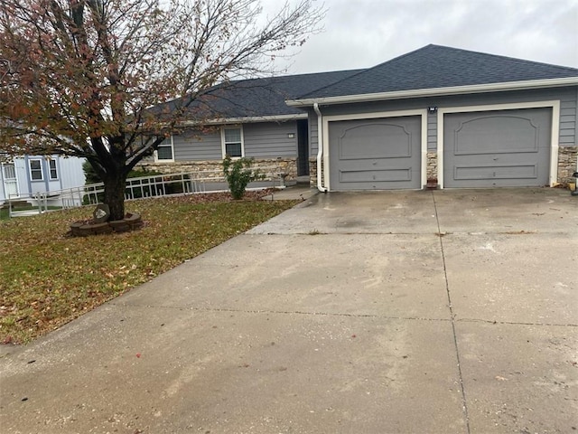 ranch-style home with a garage