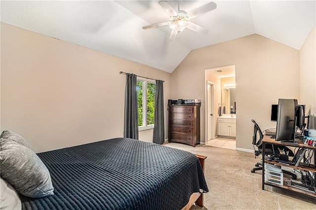 bedroom featuring connected bathroom, ceiling fan, light carpet, and lofted ceiling