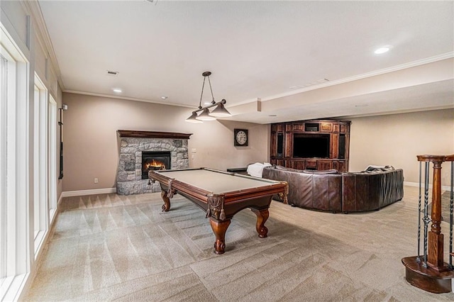 rec room featuring a stone fireplace, crown molding, light carpet, and billiards