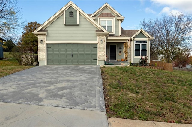 view of front facade featuring a front lawn and a garage