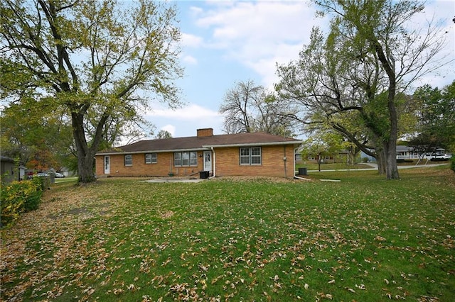 exterior space with a yard