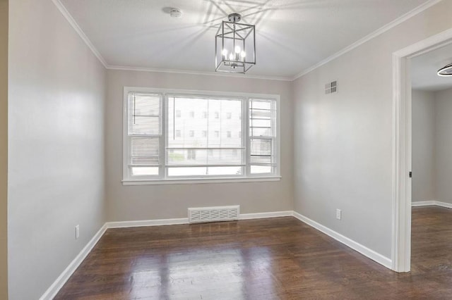 unfurnished room with an inviting chandelier, ornamental molding, and dark wood-type flooring