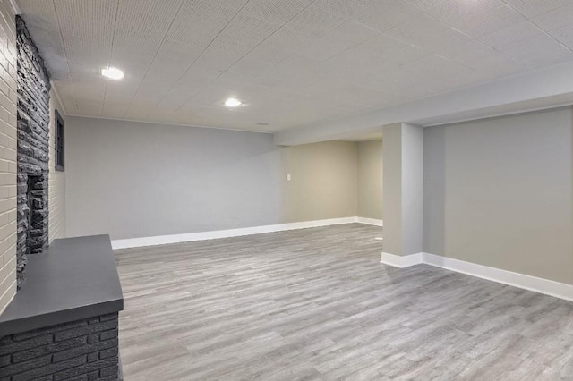 basement featuring hardwood / wood-style floors