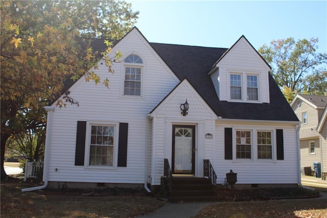 1201 W 4th St, Coffeyville, KS 67337 - view of front of property featuring crawl space and roof with shingles