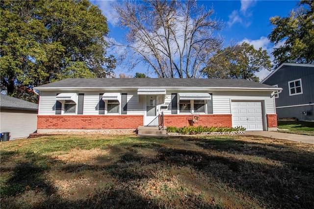 single story home featuring a front lawn and a garage