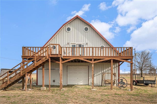 view of front of home with a wooden deck and a garage