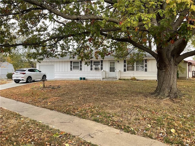 single story home with a garage