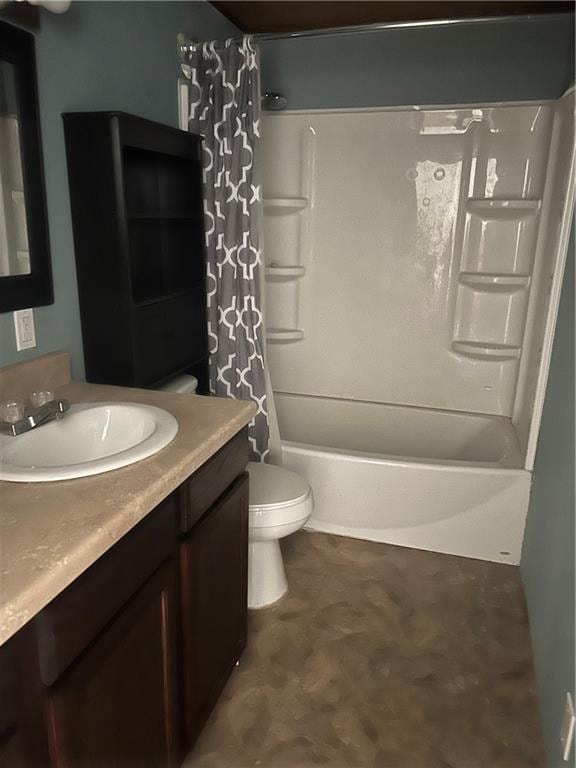 full bathroom featuring vanity, shower / tub combo, and toilet