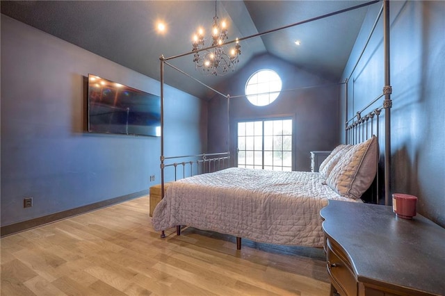 bedroom with a chandelier, baseboards, vaulted ceiling, and light wood finished floors