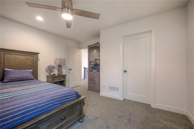 bedroom with carpet floors, recessed lighting, visible vents, a ceiling fan, and baseboards