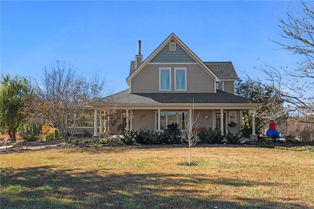 view of front of house featuring a front yard and a porch