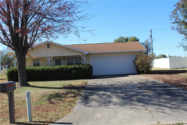 ranch-style home with a garage