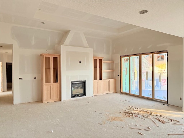 unfurnished living room with lofted ceiling