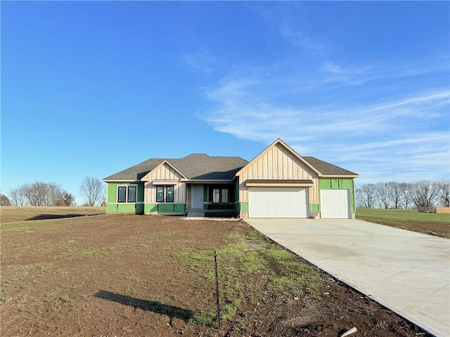 view of front facade with a front yard and a garage