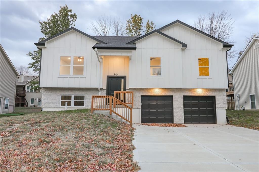 view of front of property with a garage