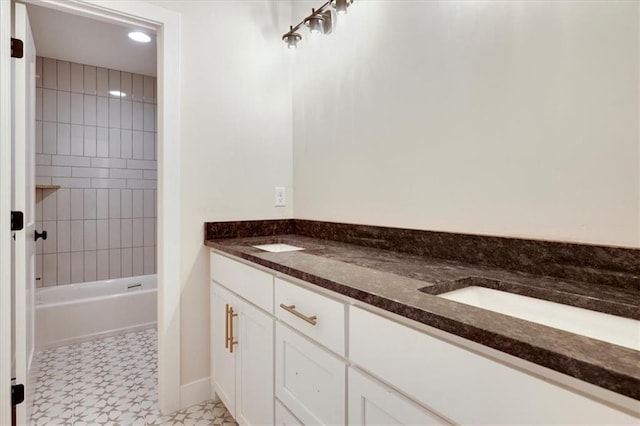 bathroom featuring vanity and shower with separate bathtub