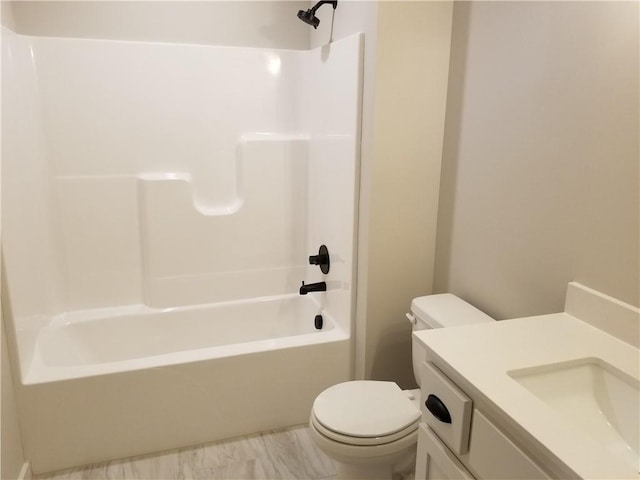 full bathroom with vanity, bathing tub / shower combination, and toilet