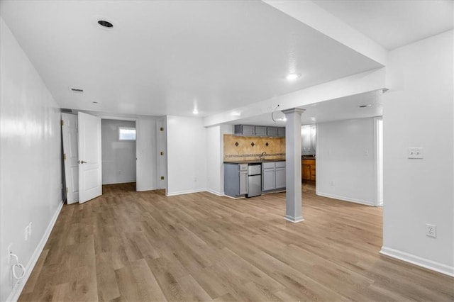 unfurnished living room featuring light wood-type flooring