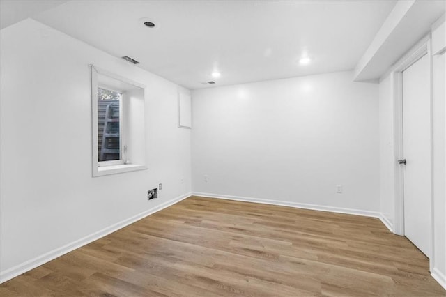 empty room featuring wood-type flooring