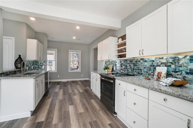 kitchen with white cabinets, stainless steel appliances, tasteful backsplash, and dark hardwood / wood-style flooring