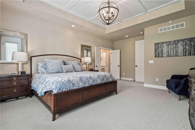 bedroom featuring coffered ceiling and a chandelier