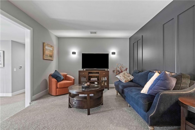 living room featuring light colored carpet