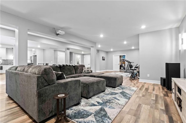 living room with light hardwood / wood-style flooring