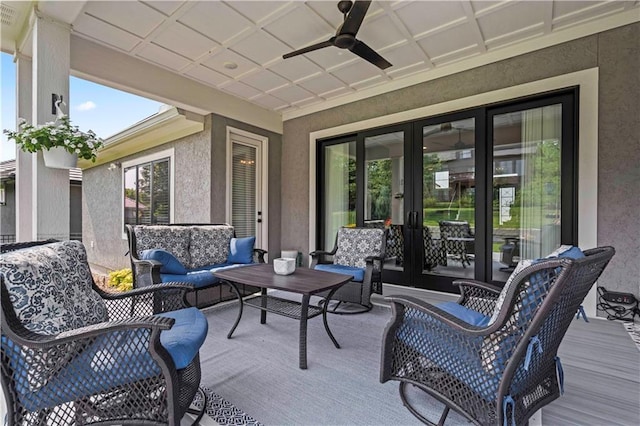 view of patio with french doors, ceiling fan, and an outdoor living space