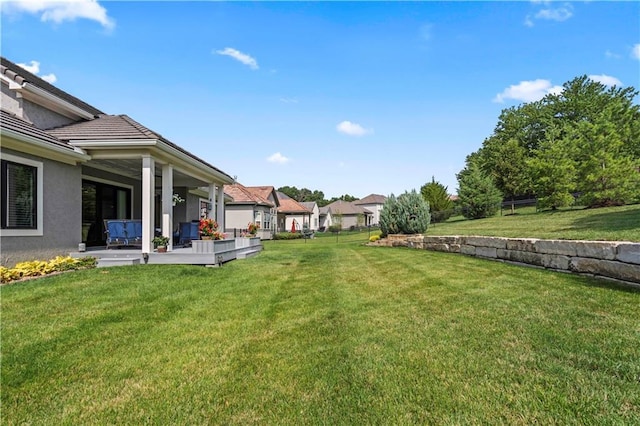 view of yard featuring a wooden deck