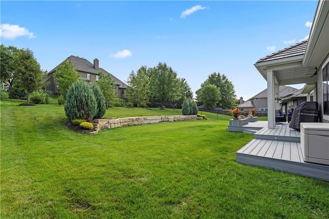 view of yard with a deck