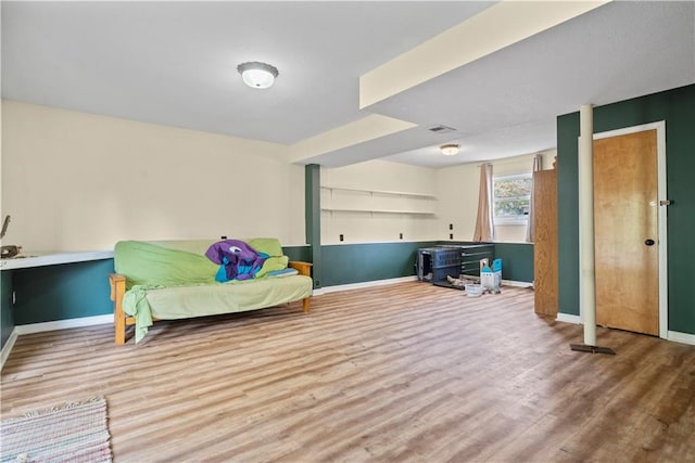 living area with wood-type flooring