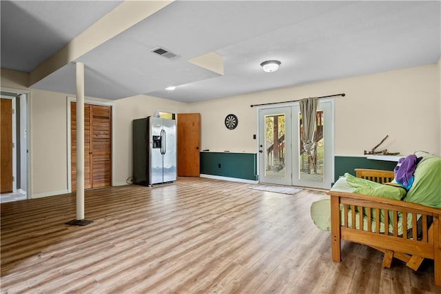 unfurnished room featuring light hardwood / wood-style floors