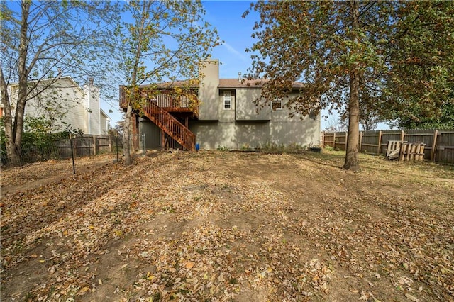 rear view of house with a deck