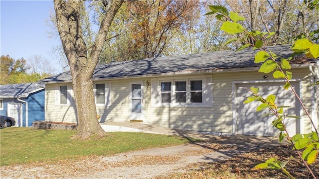 ranch-style home with a garage