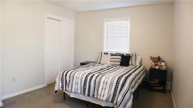 carpeted bedroom with a closet