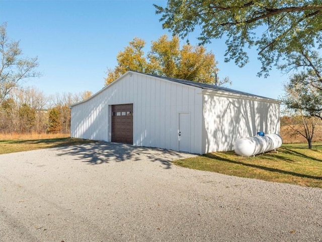 view of outbuilding featuring a garage