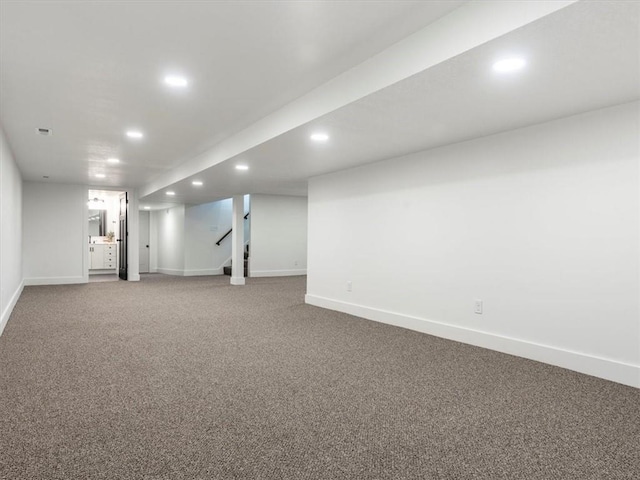 basement with carpet flooring