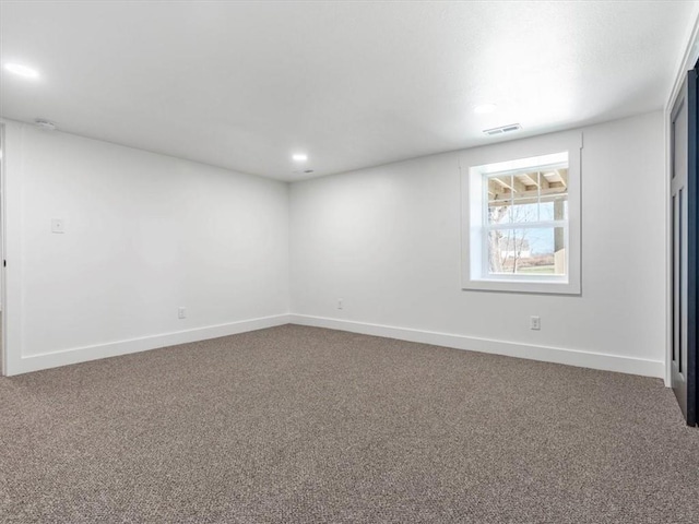 spare room featuring carpet floors